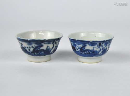 A pair of Chinese blue & white wine cups painted with deer, ...