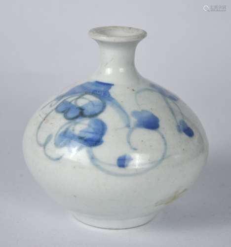 A Japanese Arita blue & white vase, 19th C.