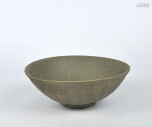 An early Chinese celadon bowl with lotus petal decoration, S...