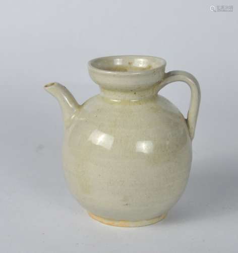 A Chinese early yellowish white glazed ewer, Song dynasty