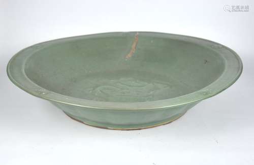 A massive Chinese celadon charger, Yuan or Ming dynasty,