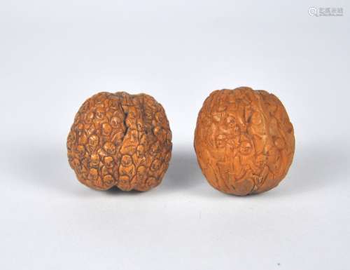Two Chinese miniature walnut carvings