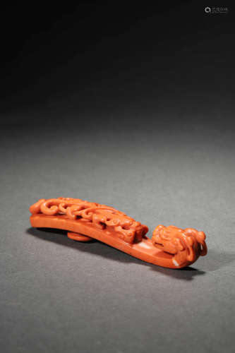 A CORAL RED DRAGON TEACHING BELT HOOK