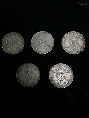 Five silver dollars