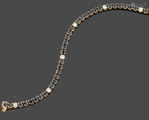 Bracelet ligne
En or jaune 18k (750) serti de saphirs r