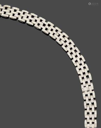 Bracelet
En or gris 18k (750) orné de 21 maillons serti