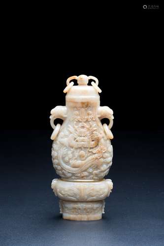 QING DYNASTY, A JADE VASE WITH CLOUD AND DRAGON PATTERN AND ...