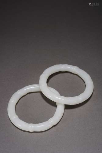 QING DYNASTY, A PAIR OF WHITE JADE AND BAMBOO BRACELETS