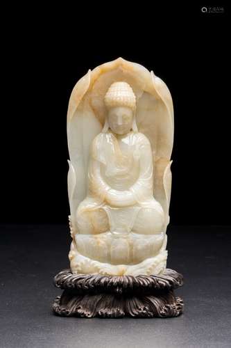 QING DYNASTY, A LARGE WHITE JADE SEATED BUDDHA, QIANLONG PER...