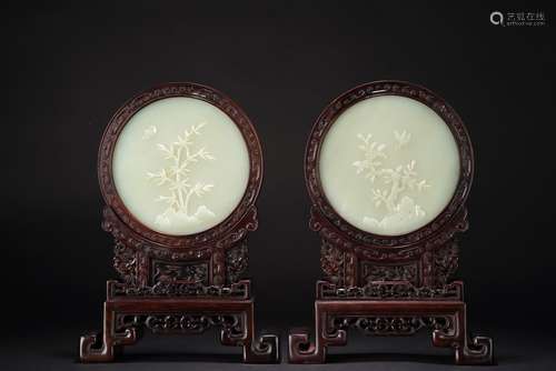 QING DYNASTY, A PAIR OF RED SANDALWOOD INLAID WHITE JADE FLO...