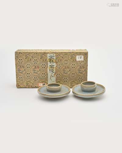 A pair of Jun-ware celadon-glazed cup stands 15th/ 16th cent...