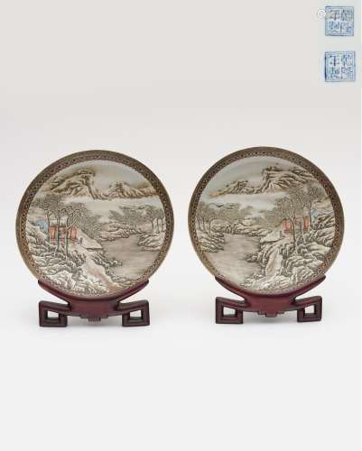 A pair of enamelled 'snowy landscapes' plates Qianlo...