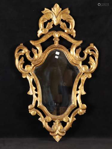 Miroir cartouche, le cadre de bois doré sculpté et ajou