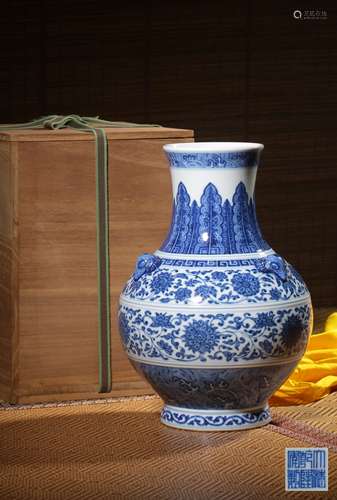 A BLUE AND WHITE ‘INTERLOCKING FLOWER’VASE,MARK AND PERIOD O...