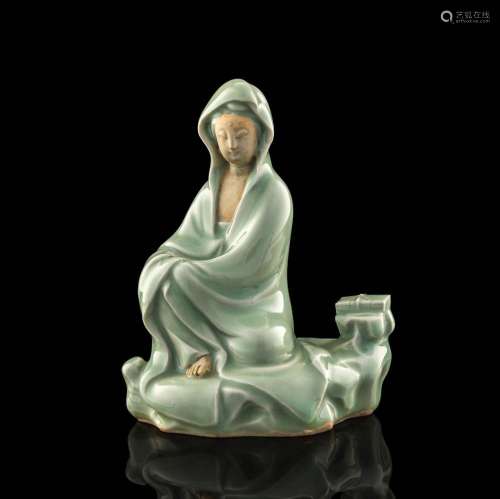 A Chinese Longquan celadon statue of Guanyin, 1950s-1970s