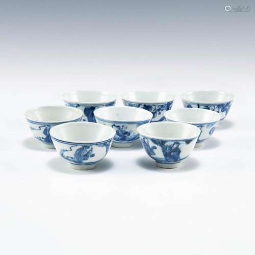 A group of eight Chinese blue and white cups, late 19th cent...
