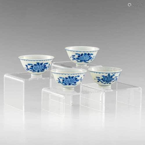 A group of four Chinese blue and white tea cups, Guangxu per...