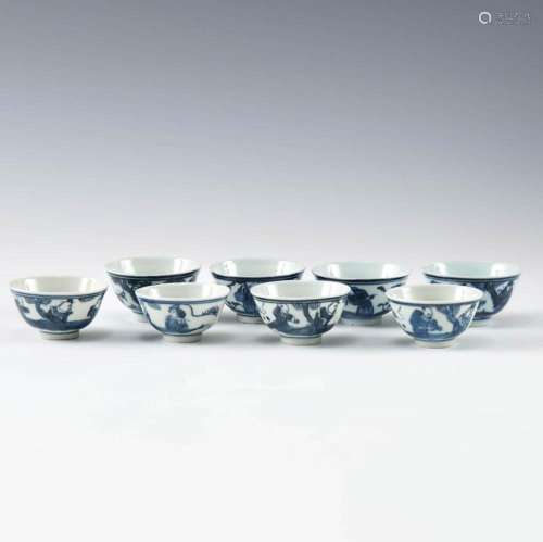 A group of eight Chinese blue and white cups, late 19th cent...