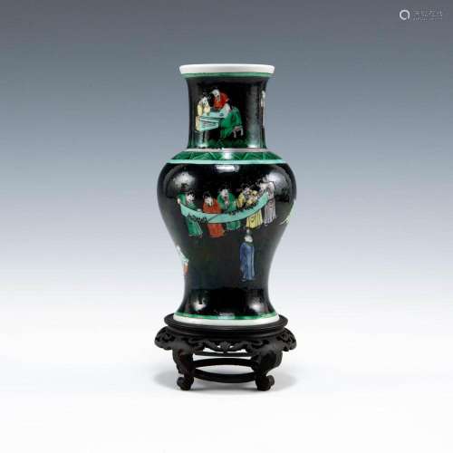 A Chinese black-ground wucai vase, late 19th century