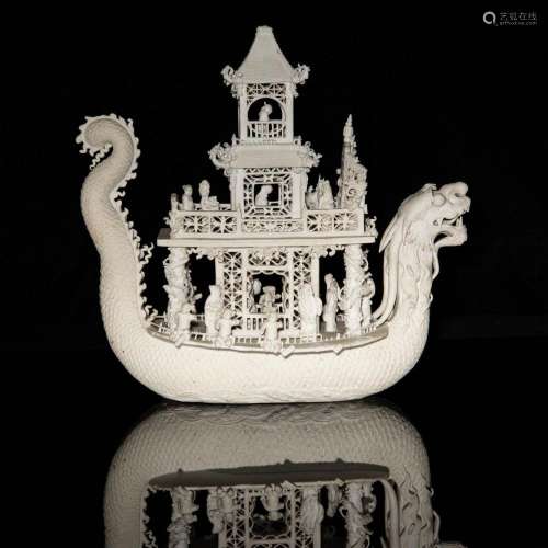 A Chinese white biscuit porcelain dragon boat, Republic peri...