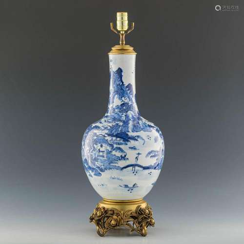 A Chinese blue and white bottle vase lamp, early 19th centur...