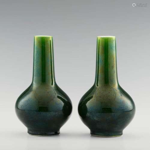 A pair of Chinese green-glazed vases, 19th century