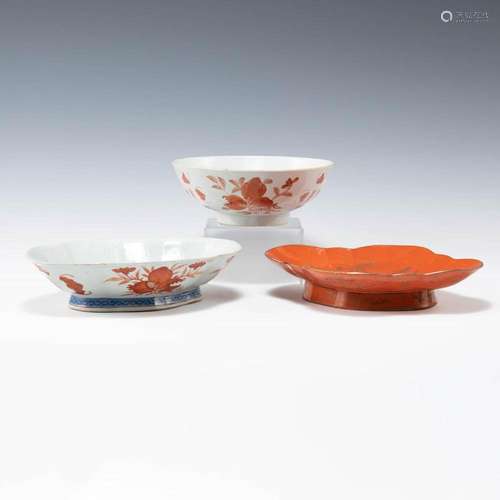 Two Chinese iron red plates and a bowl, 19th century