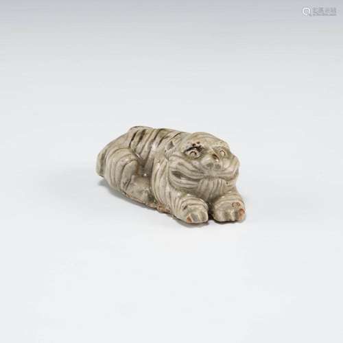 A Chinese Cizhou kiln figure of a tiger, Song dynasty