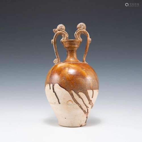 A Chinese yellow-glazed double dragon-handle amphora, Tang d...