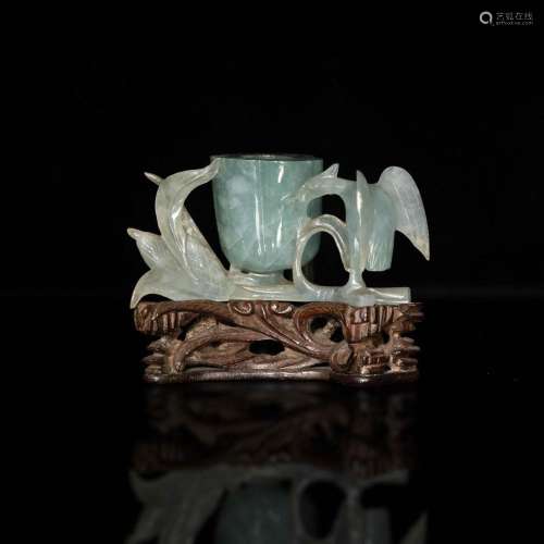 A Chinese carved jadeite water coupe, 19th century
