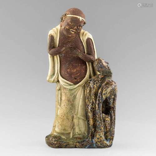 A Chinese Shiwan figure of Liu Hai, 19th century