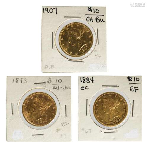 Three $10 Liberty Gold Eagles: 1884 CC (EF); 1893 (Au-UNC); ...