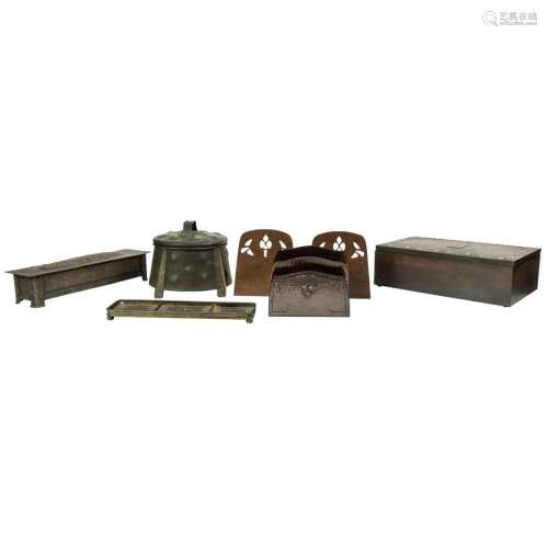 Six Arts and Crafts bronze or copper desk items including: a...