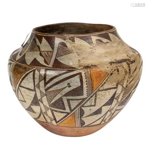 A large Acoma slip decorated pot decorated with geometric de...