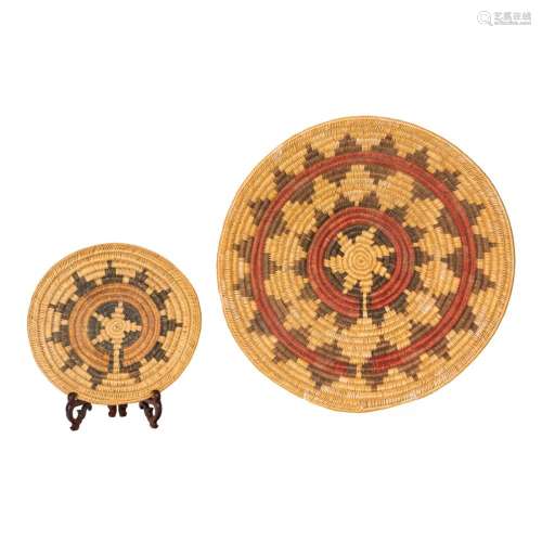 Two large Navajo ceremonial trays, each with a radiating flo...