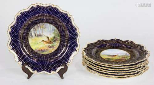 A set of seven Royal Worcester porcelain service plates reta...