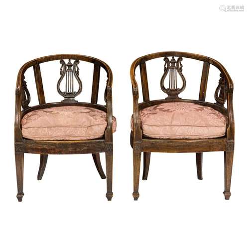 A pair of Italian tub chairs, each pierced back centering a ...