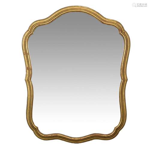 A giltwood shield form looking glass