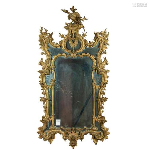 A giltwood carved Chinese Chippendale style looking glass ci...