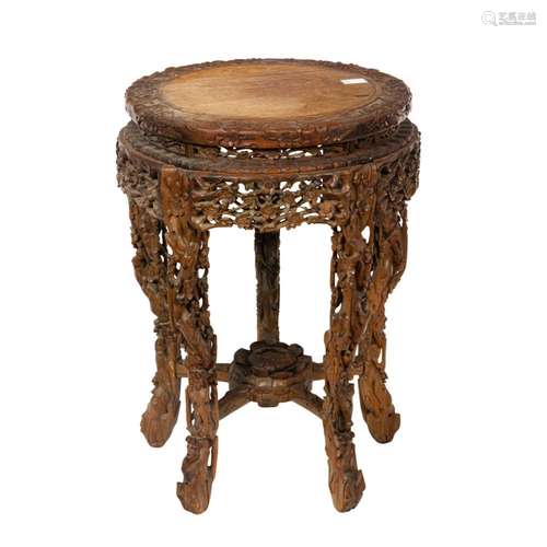 A Chinese hardwood circular stand with marble top