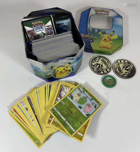 A POKEMON GO PIKACHU TIN OF ASSORTED CARDS, SOME HOLOS, TOKE...