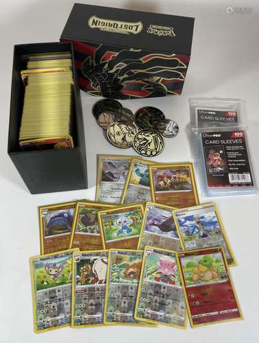 A POKEMON TRAINER BOX FULL OF ASSORTED CARDS, HOLOS, TOKENS ...