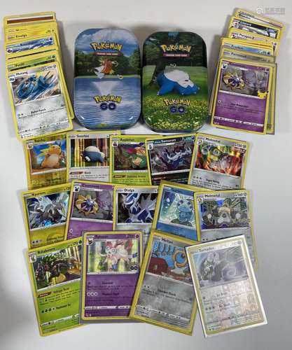 TWO POKEMON TINS OF ASSORTED CARDS, HOLOS, RAICHU, SNORLAX, ...