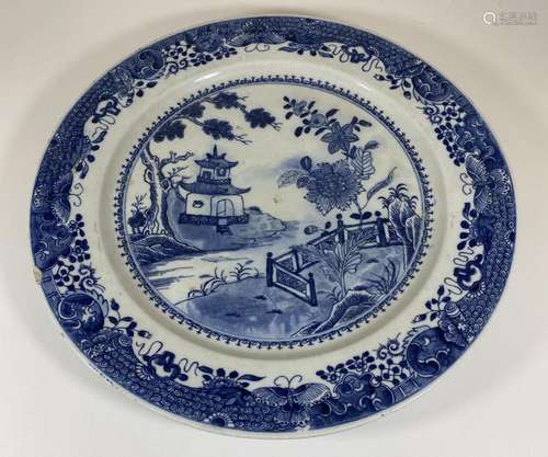 A LARGE CHINESE EARTHENWARE POTTERY BLUE AND WHITE CHARGER W...