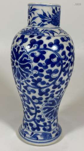 A LATE 19TH CENTURY CHINESE KANGXI STYLE BLUE AND WHITE VASE...