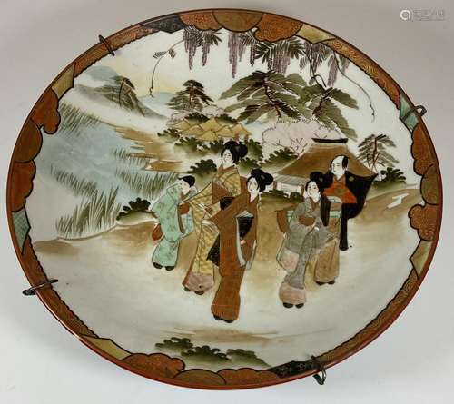 A JAPANESE MEIJI PERIOD (1868-1912) KUTANI CHARGER WITH FIGU...