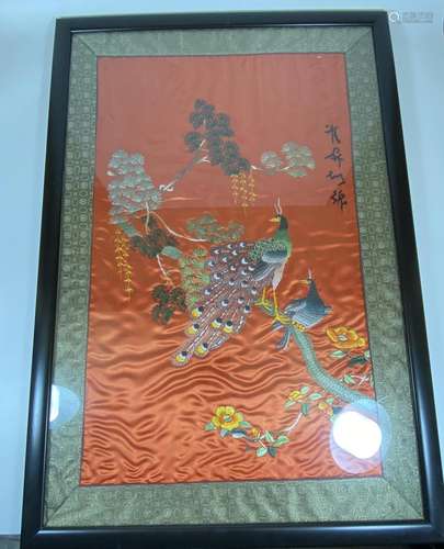 A FRAMED ORIENTAL SILK EMBROIDERY OF PEACOCKS, 62 X 42CM