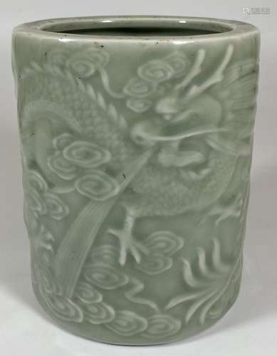 A CHINESE CELADON PORCLEAIN BRUSH POT WITH DRAGON DESIGN, HE...