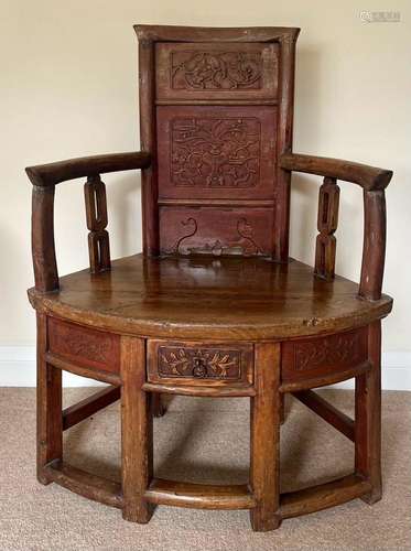 A VINTAGE CHINESE CARVED HARDWOOD CHILDS ARMCHAIR WITH LOWER...