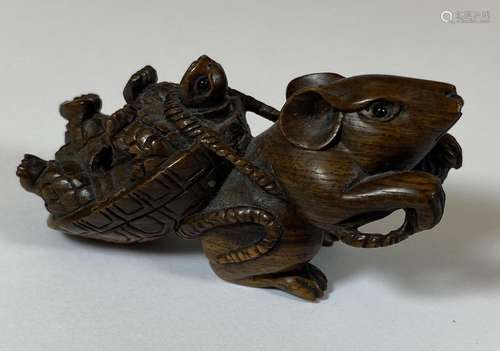 AN ORIENTAL NETSUKE OF A MOUSE DRAGGING A TURTLE, UNSIGNED, ...